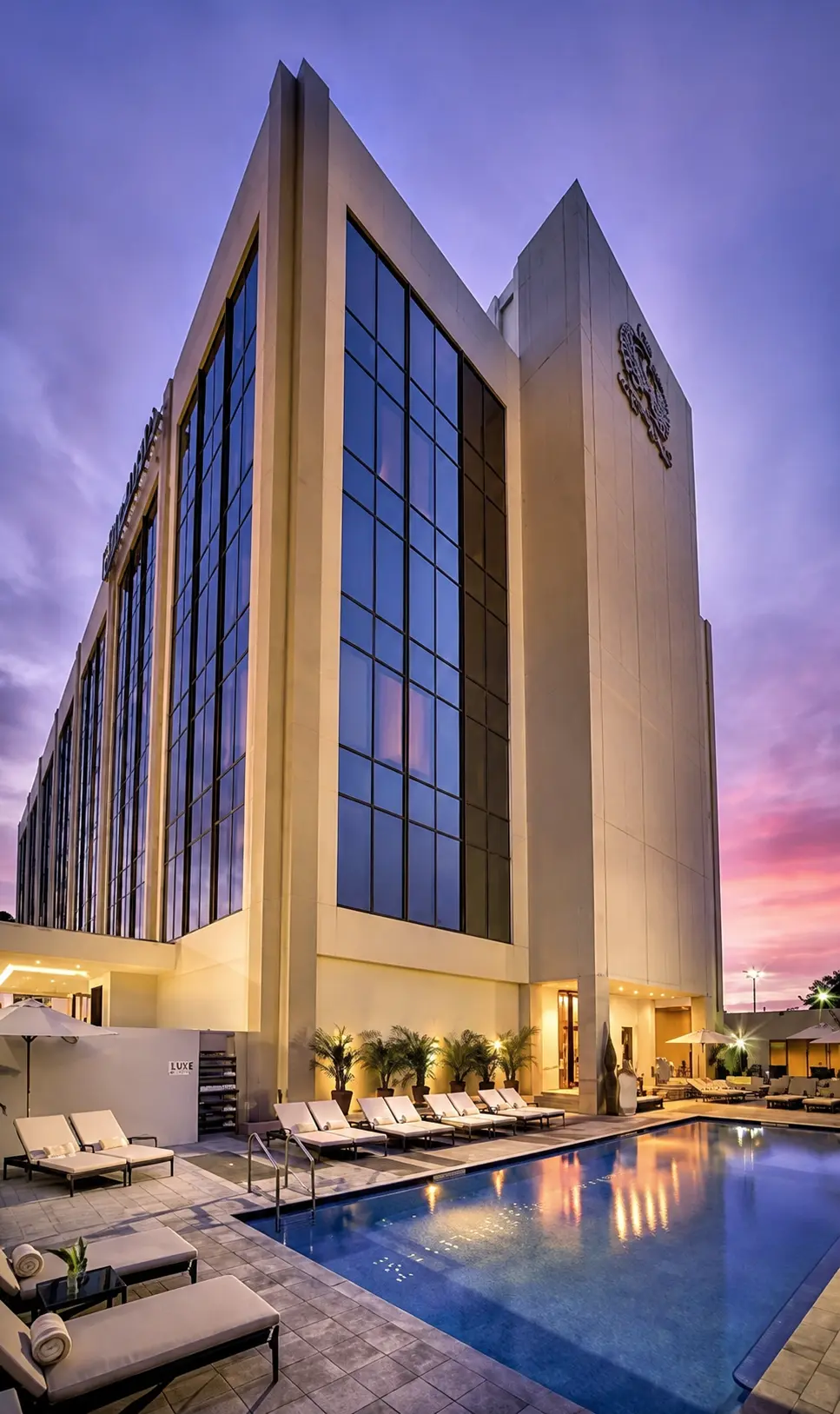The EB Hotel Miami building and pool deck at dusk